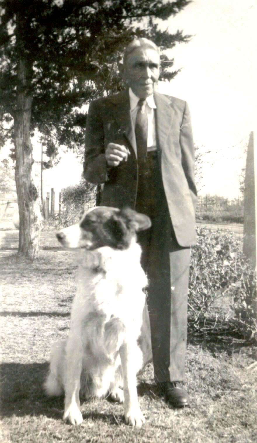 Lon Hicks and a dog about 1950